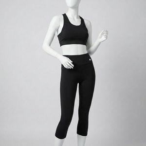 ست نیم‌تنه و شلوارک ورزشی زنانه مدل کمرگن دار کد fj 990200